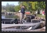 Dennis getting the 16ft Lowe ready for a day of bass fishing.